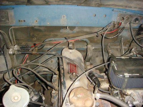 1972 Land Rover Land Rover - Close-up view of the engine compartment, showing various mechanical components and wiring.