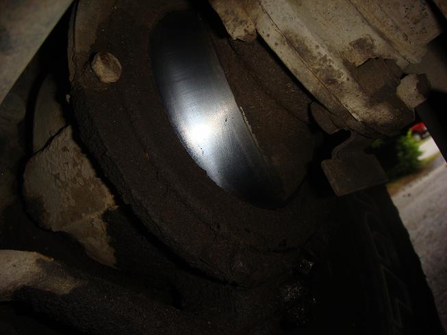 Close-up of a brake rotor and caliper assembly