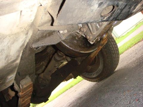 1972 Land Rover Land Rover - Underside view of a vehicle, highlighting the leaf springs and a tire.