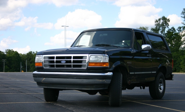 Black 1995 Ford Bronco front grille and side view