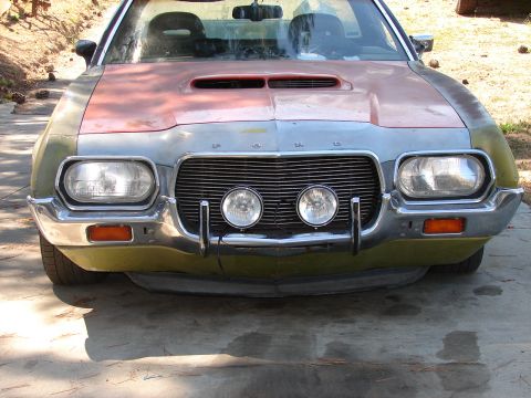 1973 Ford Ranchero - Front view of a 1970 Ford Ranchero showing its grille, headlights, and hood scoop.