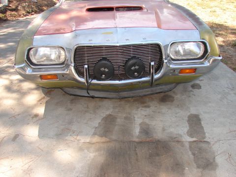 1973 Ford Ranchero - Front view of a 1973 Ford Ranchero, showing its distinctive grille and added round lights.