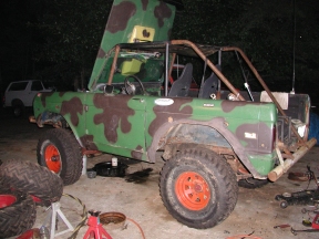 1967 Ford Bronco - View of the Driver side after the rear lift. It is hard to tell but the rig has 35" tires and the tops of the fenders are 55" hight