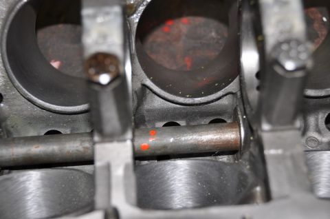 1996 Ford Bronco - Engine block interior showing cylinders and crankshaft components with red paint marks.
