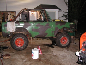1967 Ford Bronco - View of the pasenger side after the rear lift. It is hard to tell but the rig has 35" tires and the tops of the fenders are 55" hight