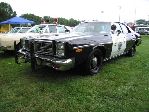 1991 Ford Crown Victoria - This police car appears to be a 1977 model, not a 1991 Ford Crown Victoria.