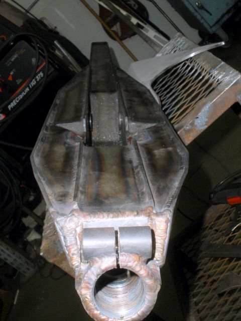 1995 Ford Bronco - A custom-fabricated metal part, possibly for a vehicle suspension system, is shown in detail.