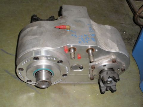 1995 Ford Bronco - This aluminum transfer case has visible fittings and markings, but no clear year identification.