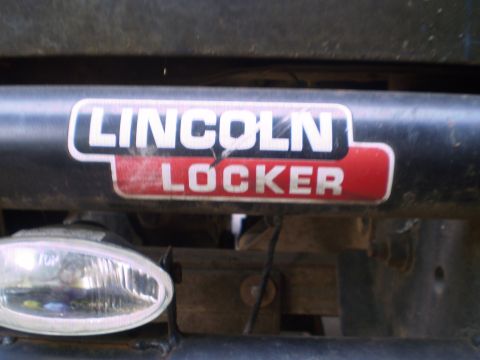 1978 Ford Bronco - A close-up view of a "Lincoln Locker" sticker on a vehicle's bumper.