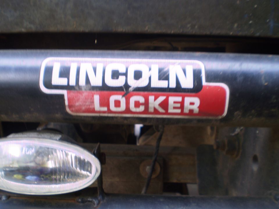 Lincoln Locker sticker on the black tube front bumper of an off-road truck