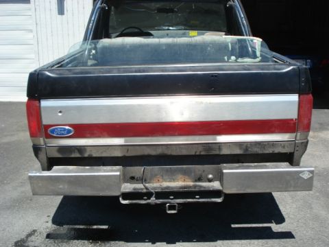 1990 Ford Bronco - Rust free tailgate. No key. Krylon black paint. Good shape.