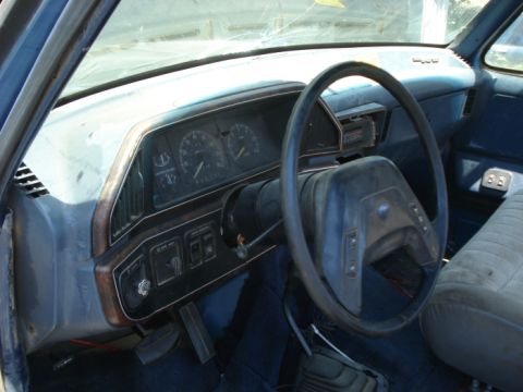 1990 Ford Bronco - Dash is in good shape. Not perfect but good. One small rip/ tear smaller than a quarter on passenger side.
