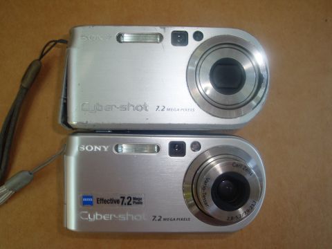 1993 Ford Taurus - Two Sony Cyber-shot digital cameras are shown, each with a 7.2 megapixel rating.