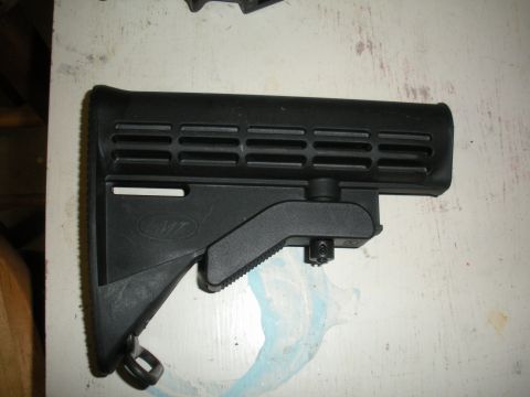 1996 Ford Bronco - A black rifle stock with the LMT logo is shown against a white background.
