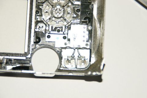 1993 Ford Taurus - Internal components of a disassembled device are visible in this close-up shot.