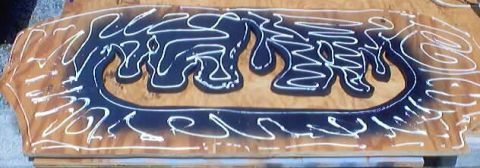 1999 Ford Taurus - A custom painted trunk lid features an abstract design in black and white over a wood grain finish.