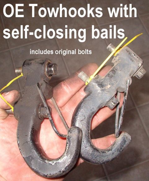 1983 Ford Bronco - Tow Hooks (cast iron) with Self-Closing Bails probably from an Isuzu Trooper Includes 4 new 3/8" Gr.8 nuts, bolts, & flat washers. Act…
