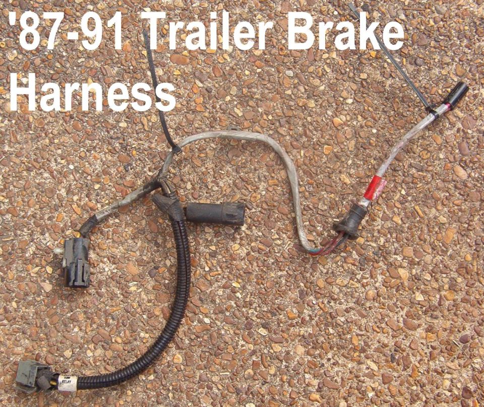 '87-91 trailer brake wiring harness laid out on gravel