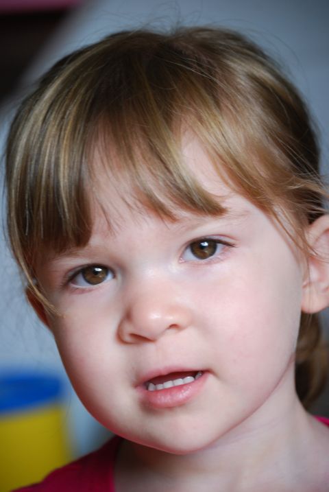 2000 Ford Crown Victoria - A young child's face is captured in a close-up portrait.