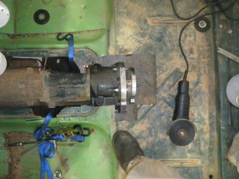 1978 Ford Bronco - Transfer case installation in progress, showing the drivetrain component and tools.