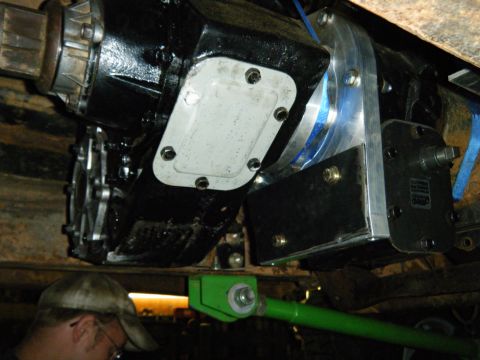 1978 Ford Bronco - Underside view of modified drivetrain components, possibly for an off-road vehicle, with visible text indicating a parts supplier.