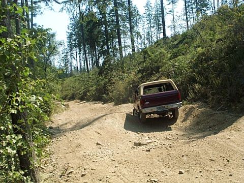 1986 Ford Bronco - Tommy and Jessica running the berms. These are actually a by pass for a pretty tough rock climb.