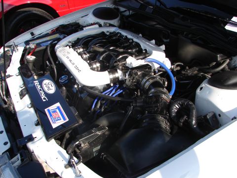 1992 Ford Taurus - Close-up of a Ford SHO V8 engine, showing the intake and "Ford Racing" branding.