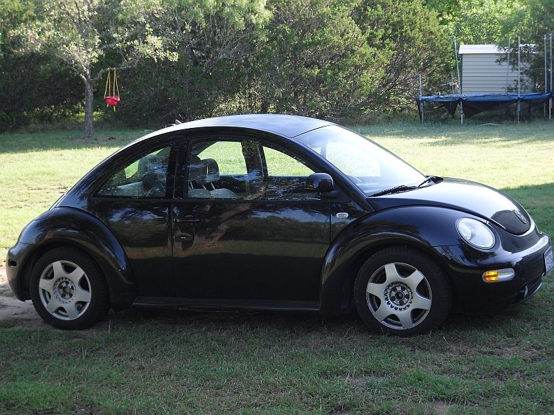 Black 1999 Volkswagen Beetle side view