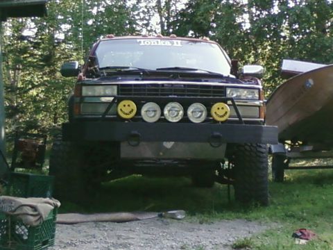 1984 Chevrolet Blazer - This modified pickup truck has a custom bumper with four auxiliary lights, two with smiley face covers.