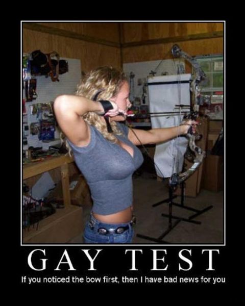 2001 Ford F-150 - A woman is shown drawing a compound bow, with text overlaying the image that reads 'GAY TEST'.