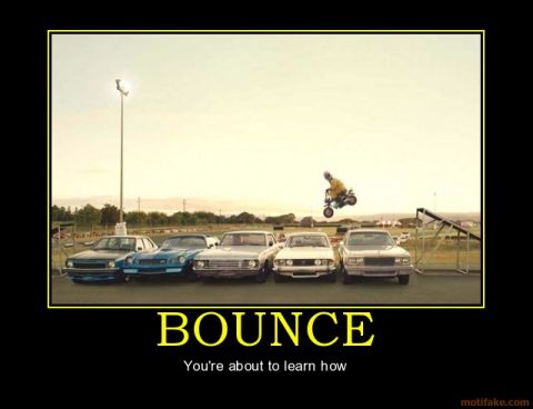 2001 Ford F-150 - A motorcyclist performs a jump over several parked cars, with a ramp in the background.