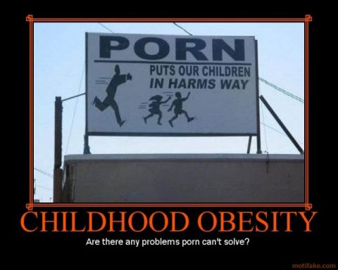 2001 Ford F-150 - A sign with a controversial message about pornography and childhood obesity is displayed outdoors.