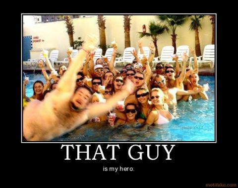 2001 Ford F-150 - A group of people celebrate in a swimming pool with drinks.