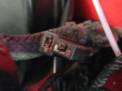 1994 Ford Probe - A close-up view of a damaged electrical connector, showing frayed wires and exposed metal components.