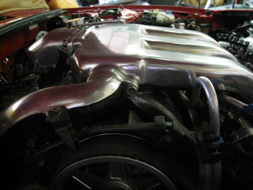Polished intake manifold in engine bay