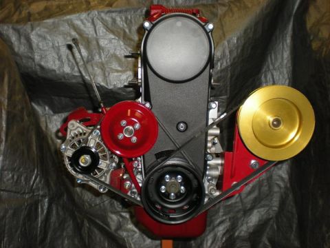 Suzuki Samurai - Engine assembly with custom red and gold pulleys and black timing cover.