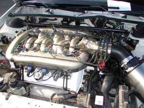 1992 Ford Taurus - Engine bay detail with V-engine, custom intake, and wiring visible. Watermark present.