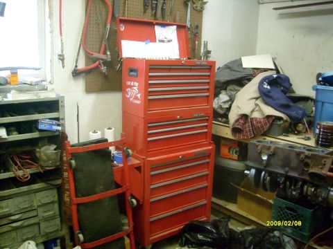 1984 Chevrolet Blazer - A red Craftsman toolbox is the central focus in a cluttered workshop setting.