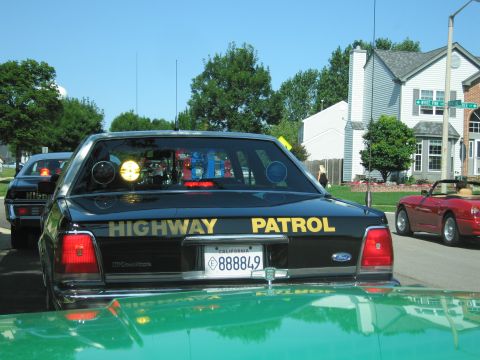 1991 Ford Crown Victoria - Rear view of a 1991 Ford Crown Victoria marked as Highway Patrol, with a California license plate.