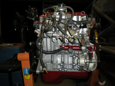 Suzuki Samurai - Engine assembly on a stand, likely for a custom build project.