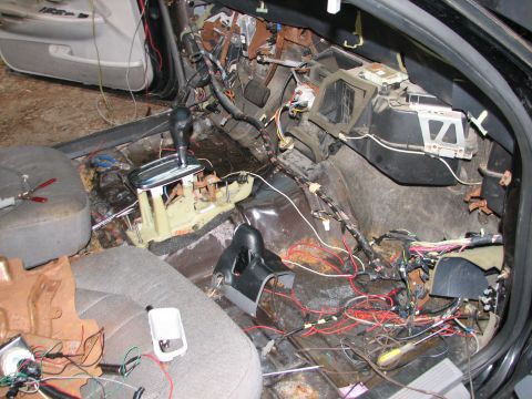 1999 Ford Crown Victoria - Dash ripped out, you can see the rust underneath from the water pooling