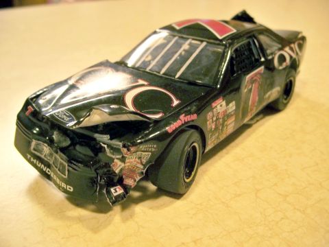 1971 Ford Ranchero - This toy Ford Thunderbird race car has significant damage to its front end.