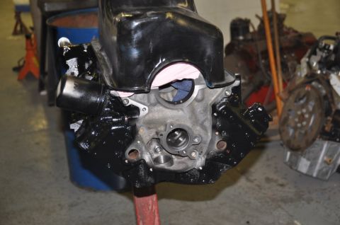 1996 Ford Bronco - Engine block assembly with oil pan removed, displayed in a workshop setting.