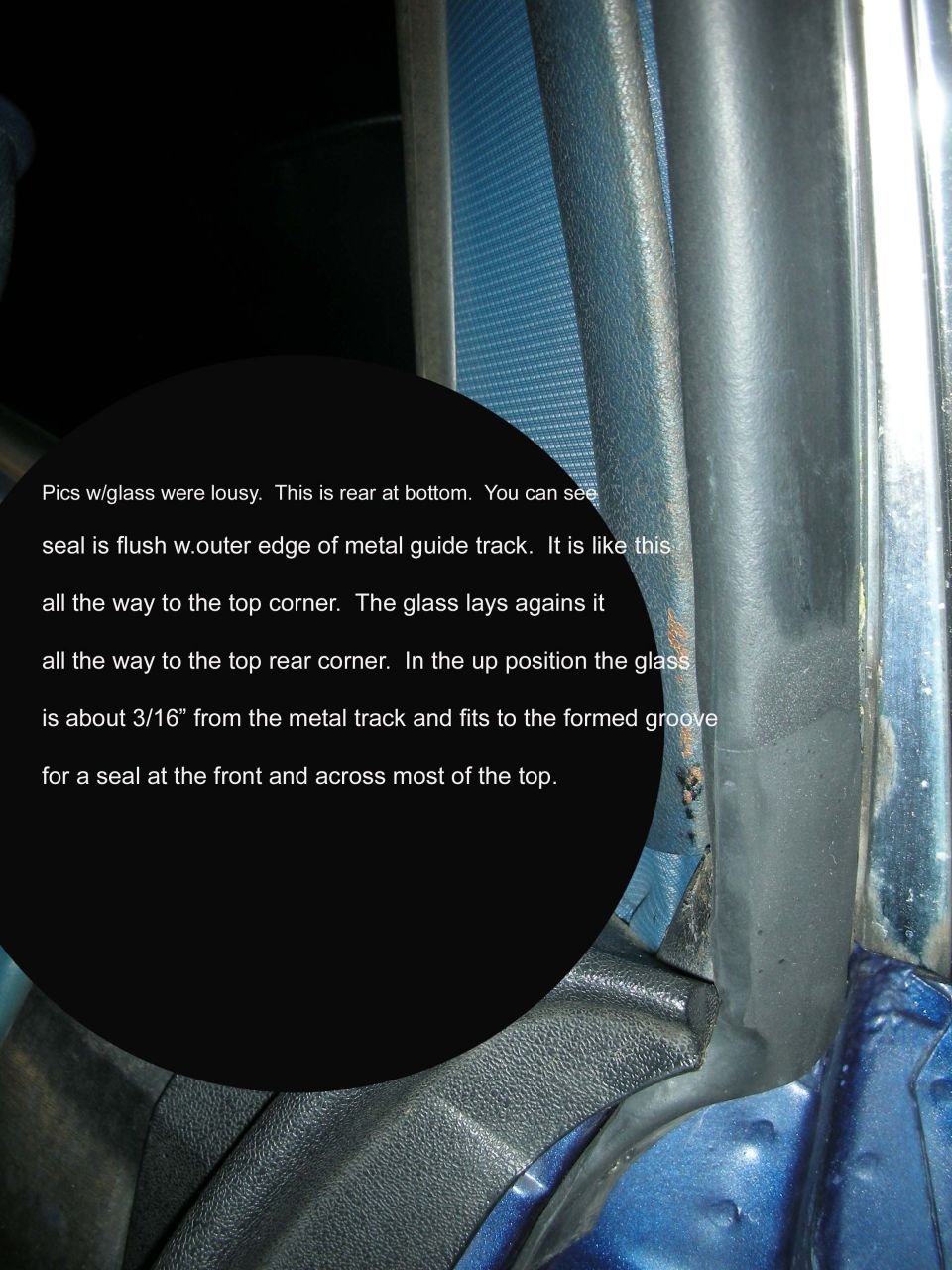 close-up of car door window seal and track