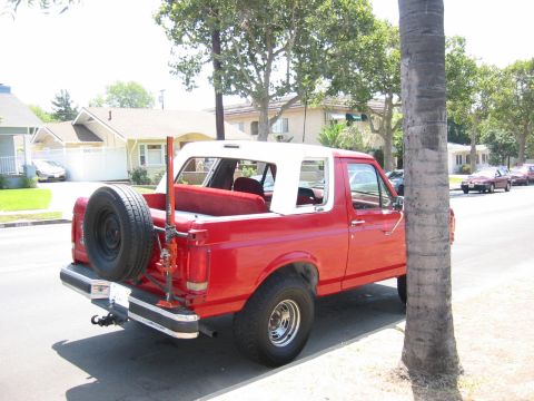 1988 Ford Bronco - There is a flat piece of steel screwed into the tops metal frame.
