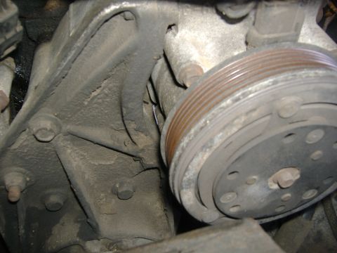 1989 Ford Bronco - One more thing left to move...not take out completely. This is the power steering pump (below not pictured) and the AC compressor. They are…