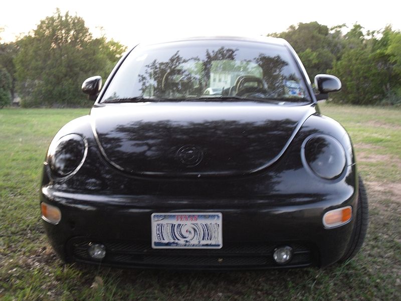 Black 1999 Volkswagen Beetle front view with Texas license plate
