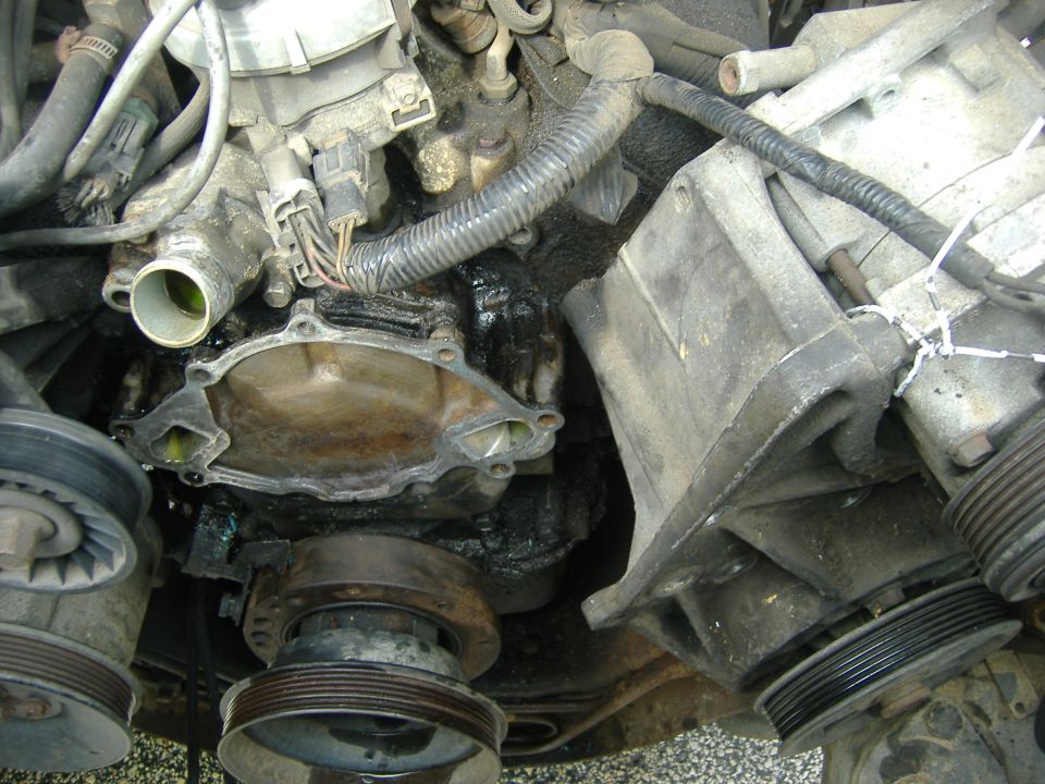 Much better.  Surface all clean and free of old gasket.  New water pump came with the gasket, but check your box.  Get it if it's not in there.  Plus some RTV gasket.  I ran some RTV around the edge of the new pump then dropped the gasket on.  Then RTV'd the back half of the gasket.  Easy does it on the RTV especially around the port holes - you don't want the suff blocking passage or breaking off and entering the system.