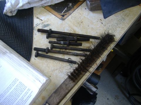 1989 Ford Bronco - Dress up your bolts before you put the new pump on. I soaked them in WD40 for a while then put them in the vise and scrubbed them with the…