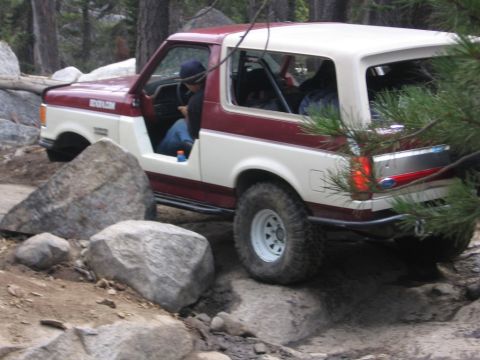 1989 Ford Bronco - This 1989 Ford Bronco is shown off-roading on a rocky trail.
